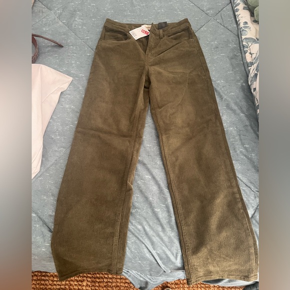 Corduroy pants. Olive green. Size runs small. - Picture 1 of 2